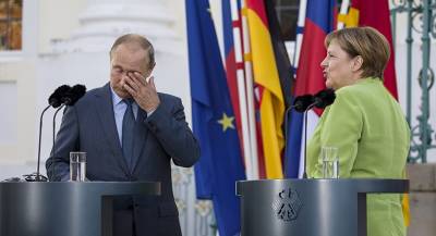 Меркель отказывает Путину в почестях