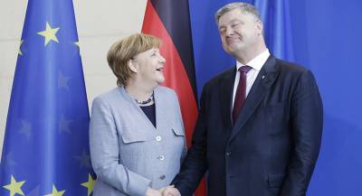 Меркель едет к Порошенко из-за Донбасса