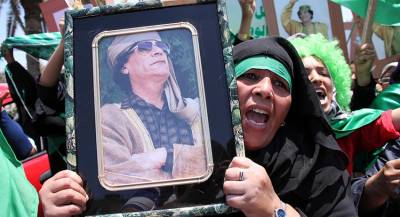 Мёртвого Каддафи ограбили в Бельгии