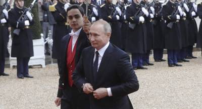 Чем занимался Путин во время визита в Париж